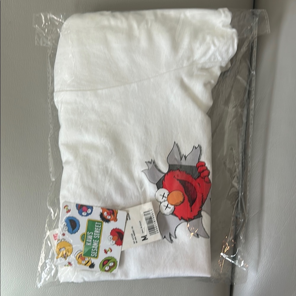 KAWS Red and White Short Sleeve Tee with Graphic Design